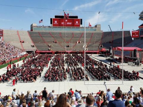 Graduates sitting in rows as before ceremony begins